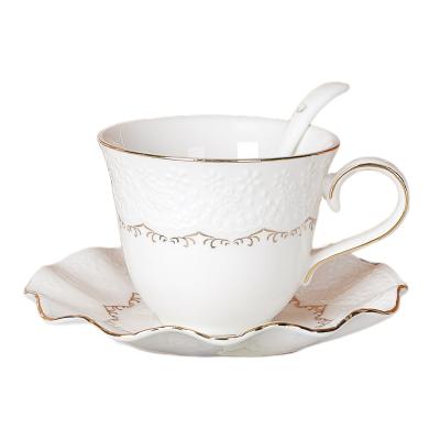 China Viable Embossed Lace Vintage Tea Cups Wholesale Ceramic Cup Saucer Tea Set for sale