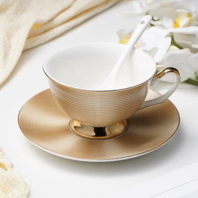 China Sustainable High Quality Embossed Luxury Tea Cups And Saucers Of Gold Rim Red Tea Cup Sets for sale