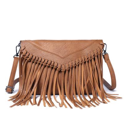 China Multifunctional Women Stretching Travel Fringed Crossy Shoulder Hobo Bag Vintage Bohemian Bag With Tassel for sale