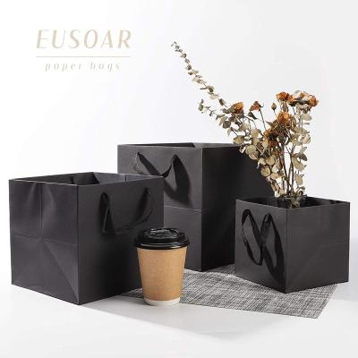 China The biodegradable multifunctional paper bag with handles festival gift shopping bag the wrapping paper packaging bag for sale