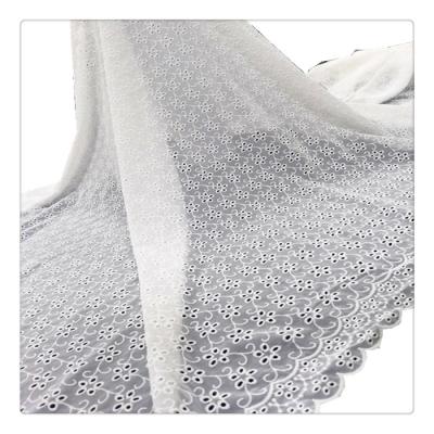 China Viable Bridal Dress Fabric White Flower Lace Embroidery Eyelet Fabric For Dress Woman Material for sale