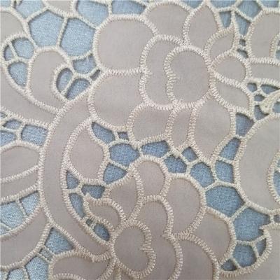 China New desigon viable 2021 100% polyester chiffon lazer cut embroidery fabric nude color for sale