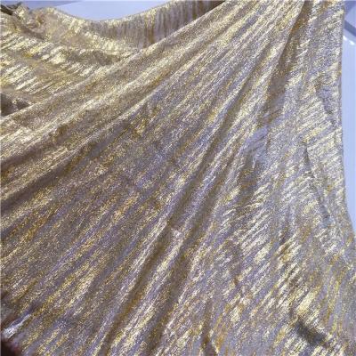 China 2021 New Arrival Gold Metal Poly Gold Tulle Fabric Viable Foil Print Bridal Gold Lace Fabric For Evening Dresses for sale