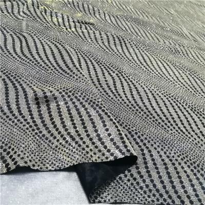 China Sustainable Technique fabric100%polyester Metal Mesh Tulle With FDY Bond Paper Printing Knitting Fabric for sale