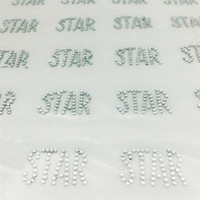 China Trendy factory fashion design custom logo rhinestone heat transfer printing for t shirts for sale