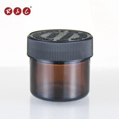 China 60ML Amber Cosmetic Childproof Glass Jar Childproof Lid For Packaging for sale