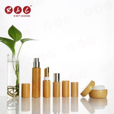 China 2022 New Arrival High Quality Glass Packaging 100ml Personal Skin Care Essential Oil Frosted Cosmetic Wood Bottles Wood With Bamboo Cap for sale