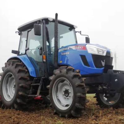 China Paddy Field High Efficiency Supply 4 Wheels Tractor Agriculture Machinery Equipment Farm Tractor for sale