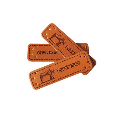 China 25pcs PU Washable Handmade Leather Labels With Sewing Machine Logo For Gift Handwork Labels for sale