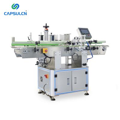 China Fully Automatic Food Benchmate T-21200 Double Side Bottle Sticker Label Printing Flat Applicator Machine For Small Round Bottles for sale