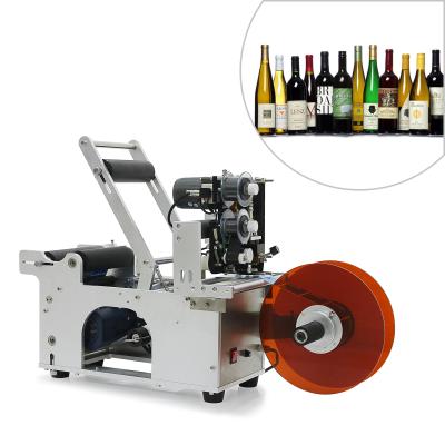 China MT-50 Food Manual Sticker Round Semi Automatic Bottle Labeling Machine for sale