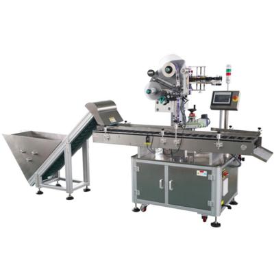 China Automatic CLOTHING Sausage Horizontal Labeling Machine With Feeder for sale