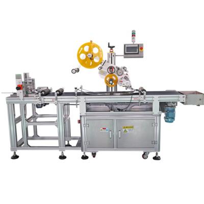 China CLOTHING High Speed ​​Automatic Scratch Card Paging&Labelling Machine for sale