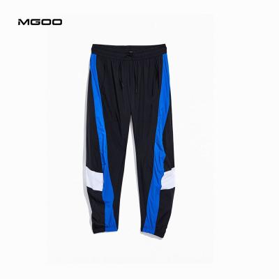 China Antibacterial Custom Colorblock Logo MGOO O-shape Nylon Wind Panties Reflective Sports Jogger for sale