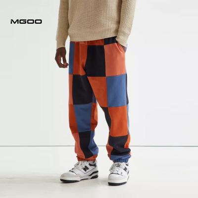 China MGOO Anti-pilling Customization Fully Patched Sweatpants Mens Embroidery Fleece Tracksuit Bottom for sale