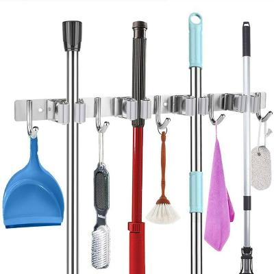 China Multi-Functional 4 Hook Racks 5 Hooks Wall Mount Broom Hook And Broom Holder For Storage Tools for sale