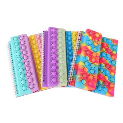 China Newly Soft Cover Silicone A5 Pop Cover Notebook Stir Sensory Toys Pop Bubbles Pop Notebook With Pencil Case for sale