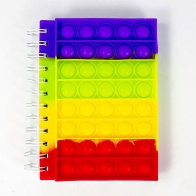 China Hot Selling Amazon Soft Cover Silicone Pop Cover Notebook Kids Back To School A6 Busty Person Toys Pop Bubbles Pop Notebook for sale