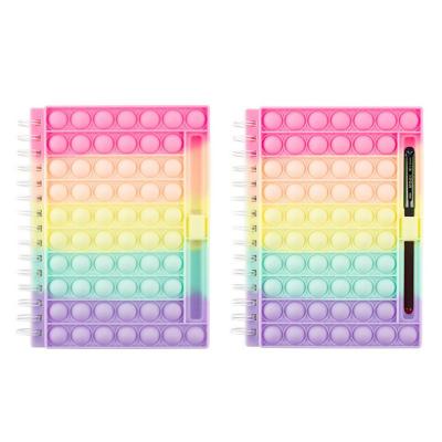 China 2022 new style soft cover silicone pop cover notebook children back to school fidgety person toys A5 size bubbles pop up notebook with pen holder for sale