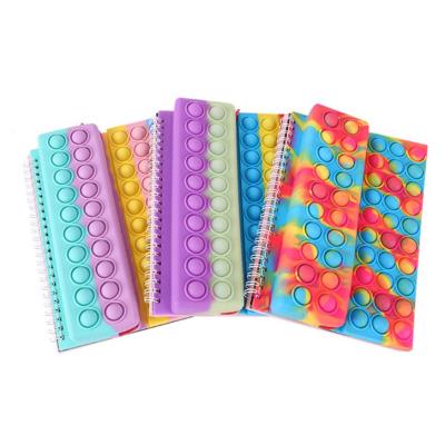 China Newly Spiral Silicone A5 Pop Cover Notebook Stir Sensory Toys Pop Bubbles Pop Notebook With Pencil Case for sale