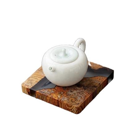 China Viable Artist Designs Japan Style Wooden Epoxy Resin Craft Pine Teapot Houlder Coaster for sale