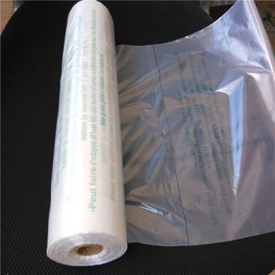 China BIODEGRADABLE Cheap T-shirt Supermarket Bags On Roll Laying Fruit for sale