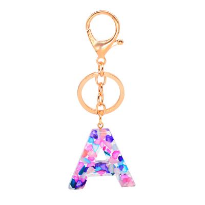 China WOMEN LOCKS Luxury Fashion 26 Letters Resin Real Flower Alphabet Key Chain Key Chain With Ring for sale