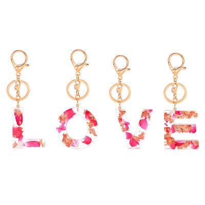 China Resin Alphabet Letter Key Chains Gift Personalized Acrylic Rose Glitter Key Chain Pink for sale