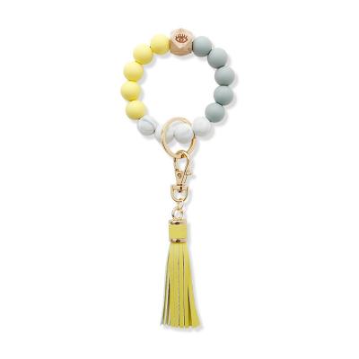 China Wholesale hot selling tassel PU silicone bead promotion gift bead keychains beads bracelet colorful wooden bracelet leather bracelets beaded key chain for sale