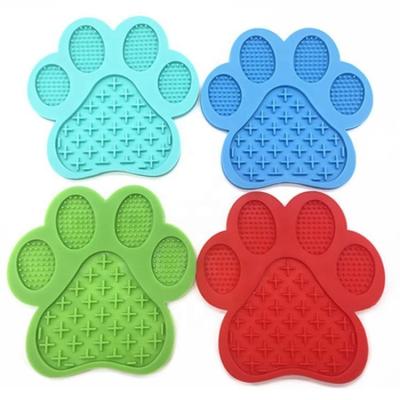 China Sustainable Cute Silicone Paw Shape With Suction Cups Slow Feeder Lick Mat Dog Bowl for sale