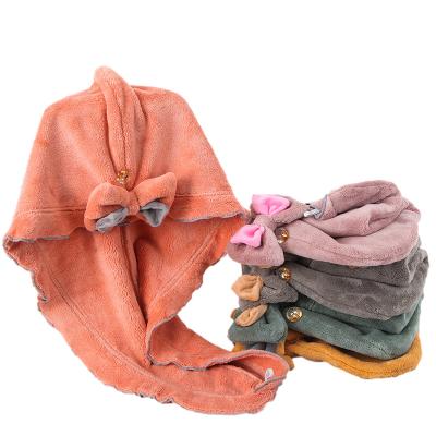 China Compressed Hair Drying New Water-absorbing Thicken Cute Bowknot Shower Quick-drying Female Scarf Coral Fleece Head Towel for sale