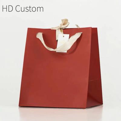 China Recyclable Custom Kraft Paper Bag 21 Clothing 50 Box With Handles Closed Factory Flat Bakery For Bread Cament Clothing Cardboard Bags for sale