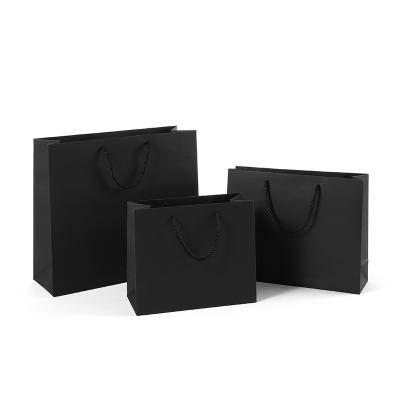 China Recyclable Black Paper Bags Handles Gift Bag Kraft Paper Party Favo Candy Take Out Merchandis for sale