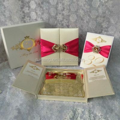 China Europe hot sale box wedding invitation luxury silk cards with rhinestone ribbons and brooches for sale