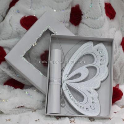 China Europe hot sale luxurious elegant white laser cut butterfly scroll wedding invitations for sale