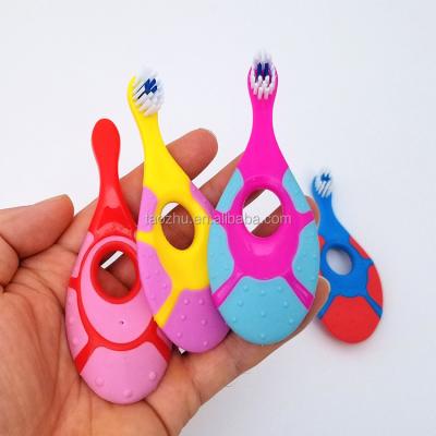 China For Baby Finger Exerciser Ultra Soft Bristles Babies Toothbrush With Cartoon Turtle Shape Handle for sale