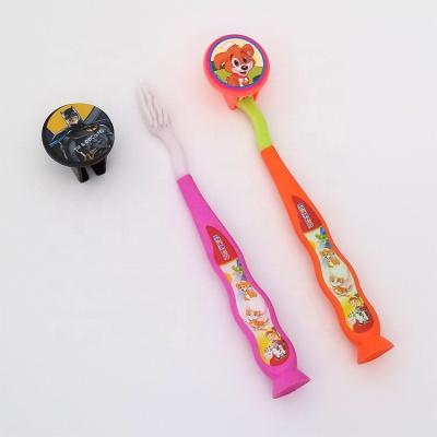 China Ultra Soft Bristle Thermal Transfer Printing Children's Toothbrush With Cartoon Cover for sale