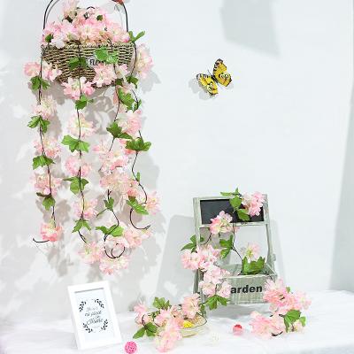 China Indoor Cherry Blossom Fake Flower Canes Garland Ceiling Eco-friendly Artificial Wedding Hanging Covering Decorative Vine for sale