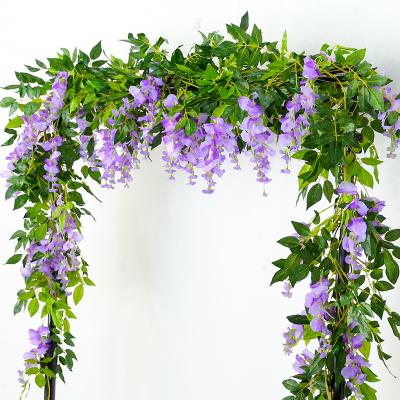 China Plastic Wisteria Flower String Vines Fake Flower Vine Winding Ceiling Living Room Wedding Eco-friendly Imitation Home Decor for sale