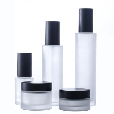 China Luxury Skincare Cosmetic Packaging Frosted Glass Bottles Set For Face Serum And Cream for sale