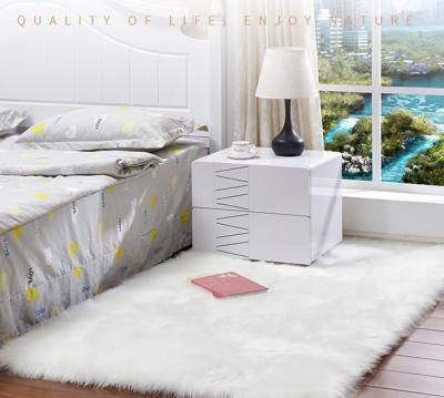 China New Trends Washable Carpet Faux Wool Blankets Microfiber Sheepskin Rug Blankets Fluffy Carpets for sale