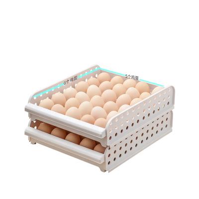 China Food grade stackable plastic egg storage rack container refrigerator egg storage tray 30 grid stackable storage eggs holder rack for sale