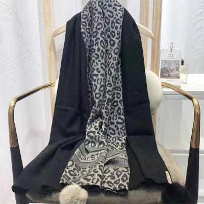 China Long Feeling Women Neck Scarf Soft Warm Leopard Print Fur Ball Polyester Winter Shawl 185cm Long for sale