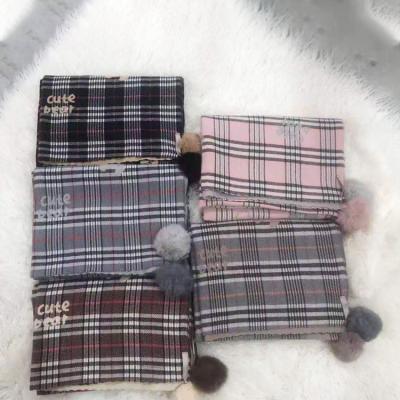 China Long Women Soft Long Printed Polyester Viscous Nylon Classic Plaid Shawls Winter Warm Scarf With Fur Ball for sale