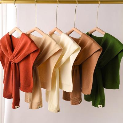 China Fashion Solid Color Women Cape Sweater Striped Acrylic Warm Soft Shawls Knitted Poncho for sale