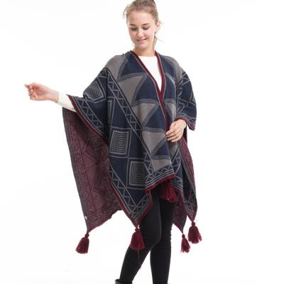 China Plus Size Geometry Pattern Women Striped Acrylic Cape Shawls Knitted Poncho With Tassel for sale