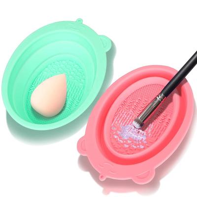 China Amazon Best Selling Professional Foldable Silicone Brush Cleaning Pad Makeup Brush Cleaning Bowl Pink and Green Normal Size for sale