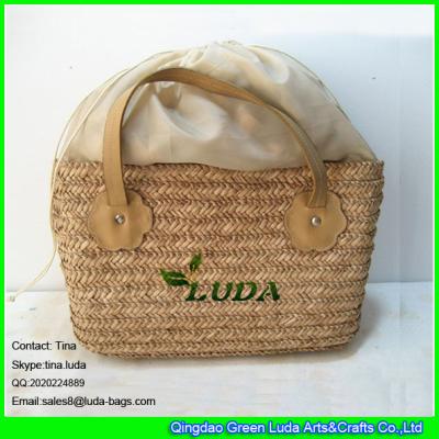 China LUDA nautral handmade seagrass straw  basket bag with drawstring fabric for sale