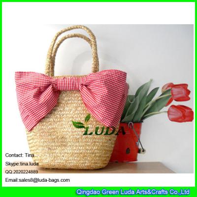 China LUDA ladies summer fashion bowknot wheat straw beach bags for sale