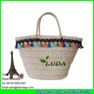 中国 LDYP-009 high quality macrame decoration women summer cornhusk made natural straw beach bag 販売のため